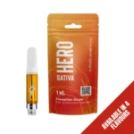 Hero Sativa THC-JD 1ml vape cartridge in Hawaiian Snow flavour with 510 CCELL technology, displayed next to sunrise-coloured packaging. Available in 4 flavours.