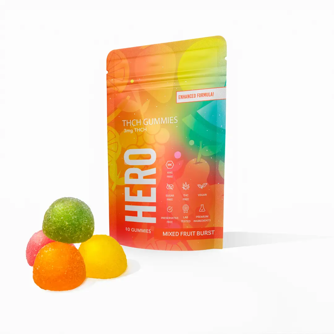 HERO THCH Gummies in mixed fruit burst flavour, featuring colourful gummy candies and vibrant packaging with enhanced formula, 3mg THCH per gummy, vegan and preservative-free