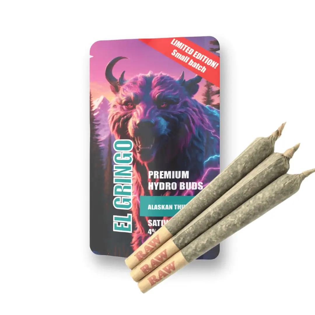 El Gringo Limited Edition Premium Hydro Buds in Alaskan Thunder Fuck flavour, Sativa 40% THC blend, with bold packaging featuring a wolf, accompanied by three RAW pre-rolled joints