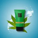 Code Fast Crema de CBD de Alto Rendimiento en tubo verde de 100ml con hojas de cannabis y fondo de salpicaduras de agua, destacando la hidratación y los beneficios del CBD para el cuidado de la piel.